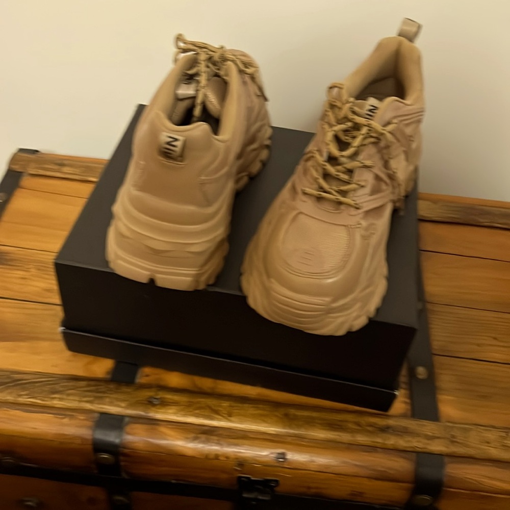 Tan running shoes. Never worn.